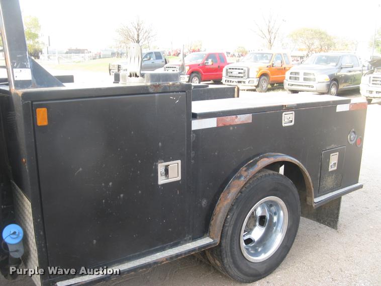 image for item L3902 2011 Dodge Ram 3500HD SLT Crew Cab flatbed pickup truck