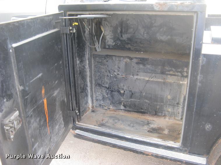 image for item L3902 2011 Dodge Ram 3500HD SLT Crew Cab flatbed pickup truck