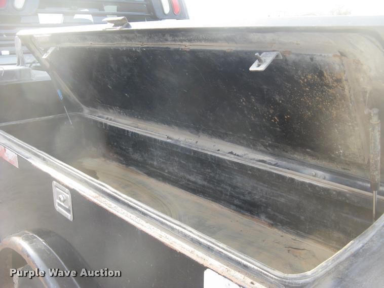 image for item L3902 2011 Dodge Ram 3500HD SLT Crew Cab flatbed pickup truck