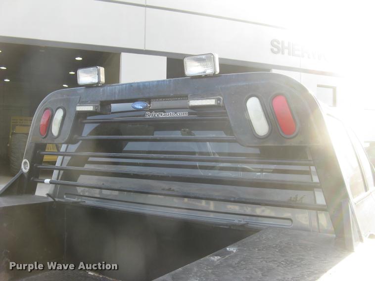 image for item L3902 2011 Dodge Ram 3500HD SLT Crew Cab flatbed pickup truck