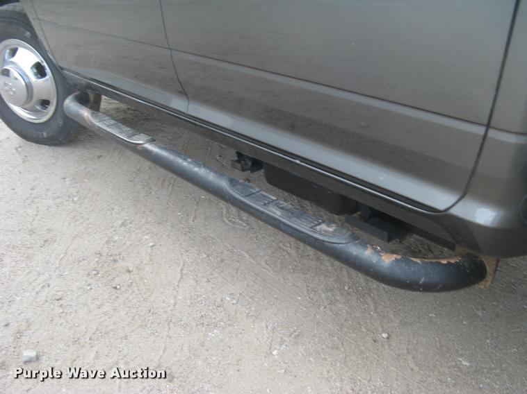 image for item L3902 2011 Dodge Ram 3500HD SLT Crew Cab flatbed pickup truck