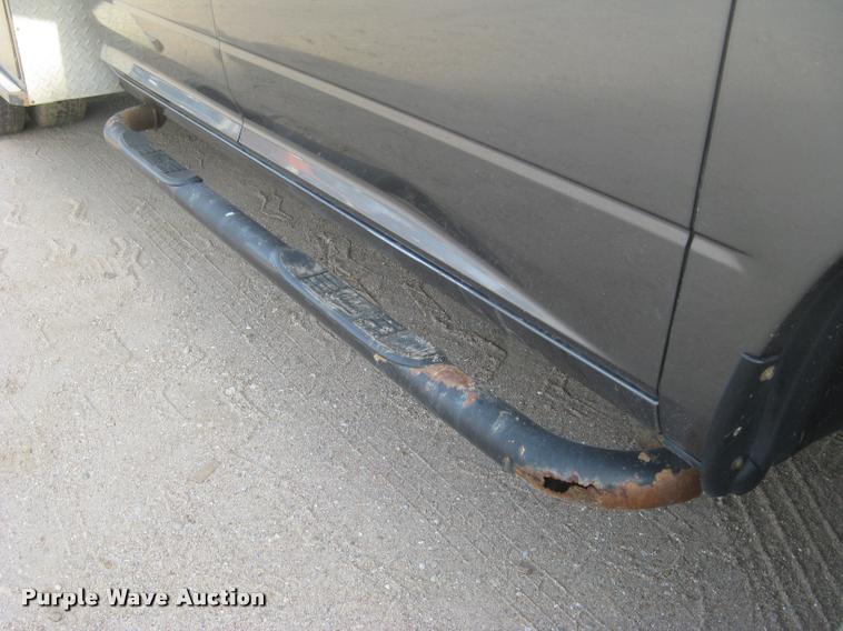 image for item L3902 2011 Dodge Ram 3500HD SLT Crew Cab flatbed pickup truck