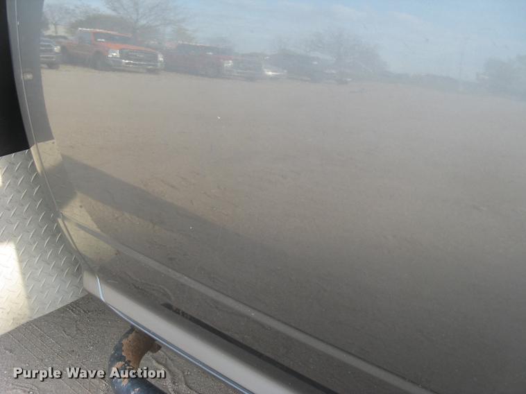 image for item L3902 2011 Dodge Ram 3500HD SLT Crew Cab flatbed pickup truck