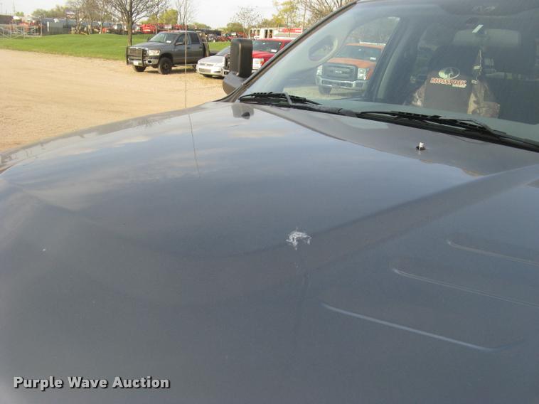 image for item L3902 2011 Dodge Ram 3500HD SLT Crew Cab flatbed pickup truck