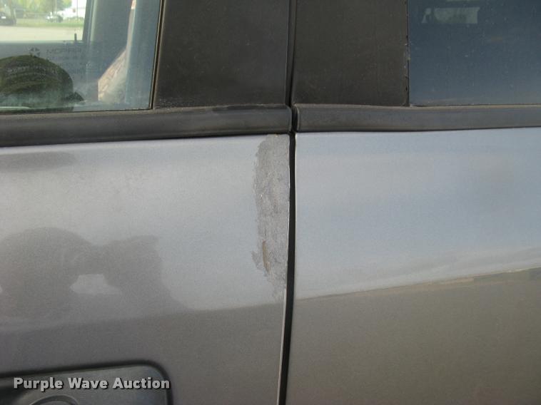 image for item L3902 2011 Dodge Ram 3500HD SLT Crew Cab flatbed pickup truck