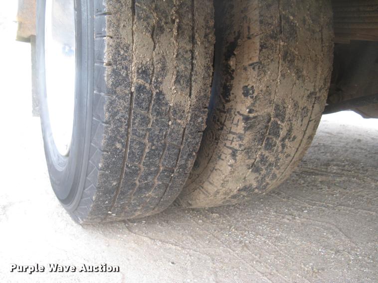 image for item L3902 2011 Dodge Ram 3500HD SLT Crew Cab flatbed pickup truck