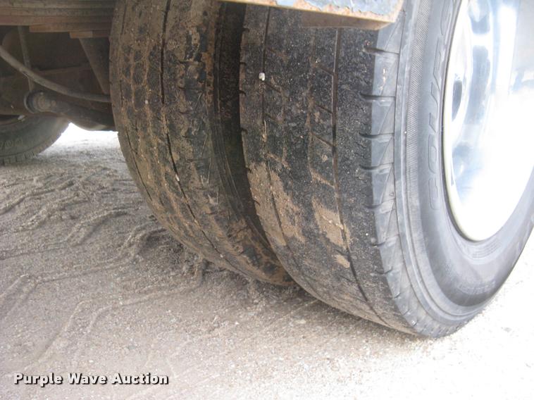 image for item L3902 2011 Dodge Ram 3500HD SLT Crew Cab flatbed pickup truck