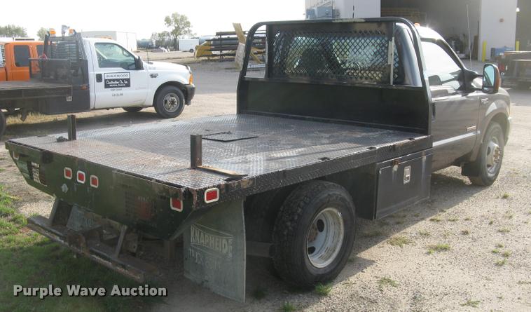 image for item L3903 2004 Ford F350 Super Duty XLT flatbed pickup truck