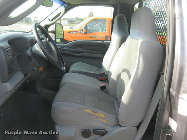 image for item L3903 2004 Ford F350 Super Duty XLT flatbed pickup truck