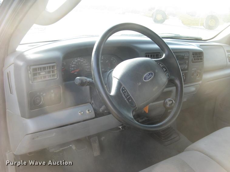 image for item L3903 2004 Ford F350 Super Duty XLT flatbed pickup truck