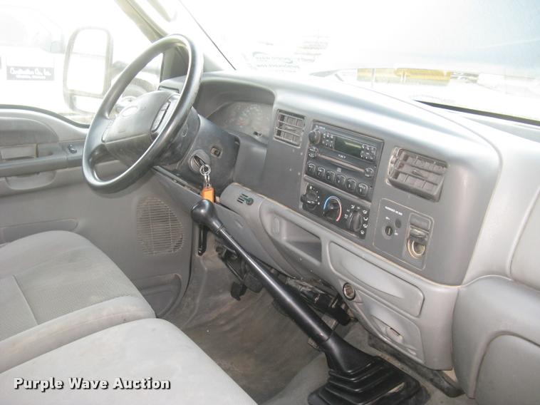 image for item L3903 2004 Ford F350 Super Duty XLT flatbed pickup truck