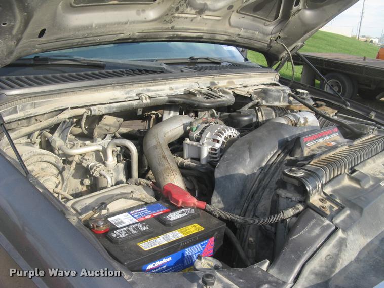 image for item L3903 2004 Ford F350 Super Duty XLT flatbed pickup truck