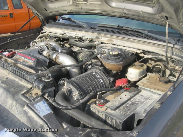 image for item L3903 2004 Ford F350 Super Duty XLT flatbed pickup truck