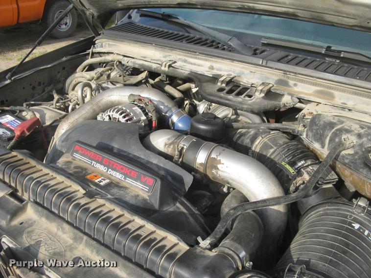 image for item L3903 2004 Ford F350 Super Duty XLT flatbed pickup truck