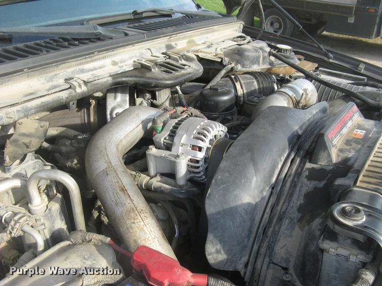 image for item L3903 2004 Ford F350 Super Duty XLT flatbed pickup truck