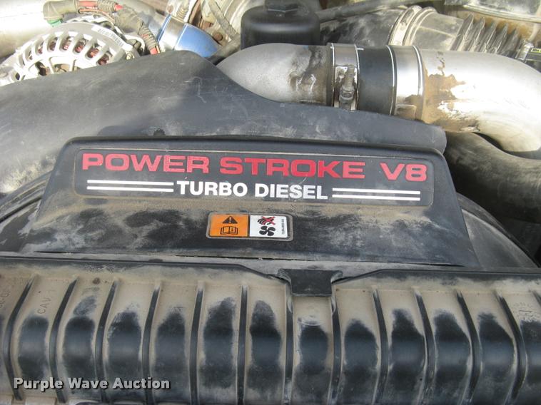 image for item L3903 2004 Ford F350 Super Duty XLT flatbed pickup truck