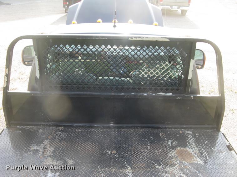 image for item L3903 2004 Ford F350 Super Duty XLT flatbed pickup truck