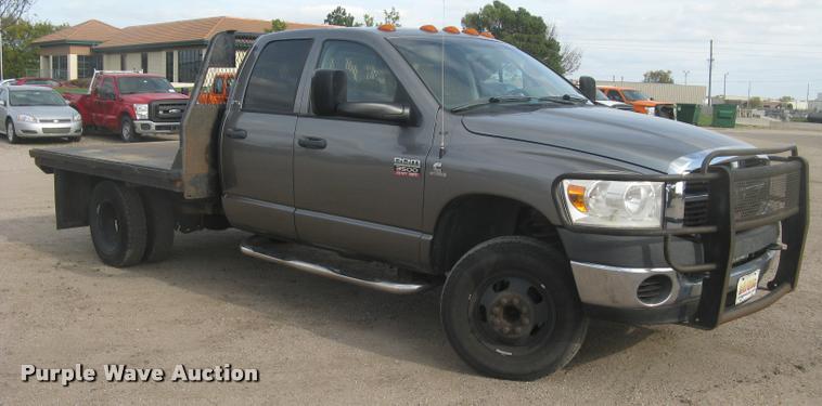 image for item L3905 2008 Dodge Ram 3500HD SLT Quad Cab flatbed pickup truck