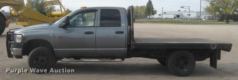 image for item L3905 2008 Dodge Ram 3500HD SLT Quad Cab flatbed pickup truck