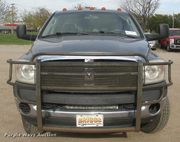 image for item L3905 2008 Dodge Ram 3500HD SLT Quad Cab flatbed pickup truck