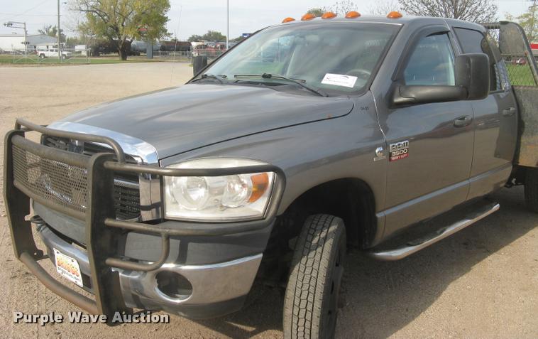 image for item L3905 2008 Dodge Ram 3500HD SLT Quad Cab flatbed pickup truck