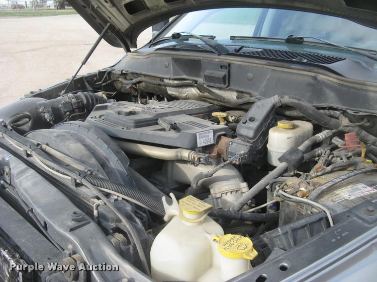 image for item L3905 2008 Dodge Ram 3500HD SLT Quad Cab flatbed pickup truck