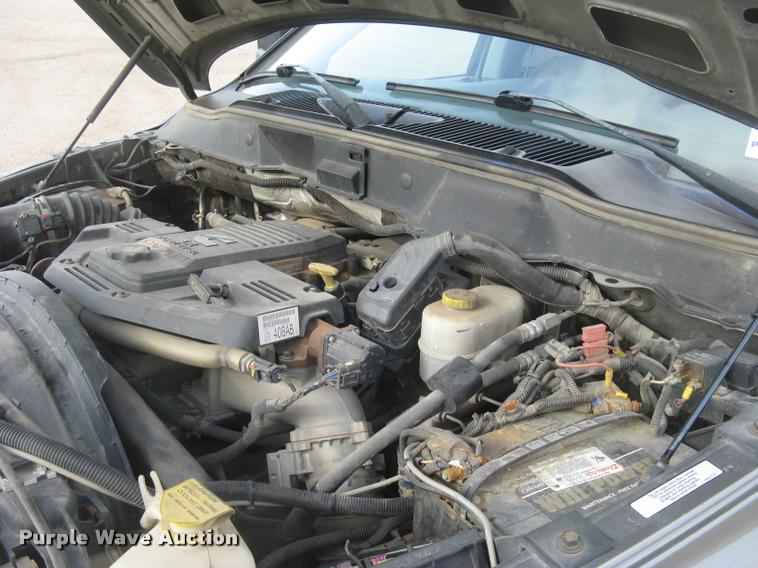 image for item L3905 2008 Dodge Ram 3500HD SLT Quad Cab flatbed pickup truck