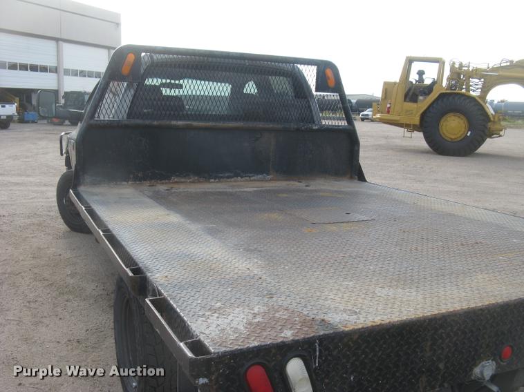 image for item L3905 2008 Dodge Ram 3500HD SLT Quad Cab flatbed pickup truck