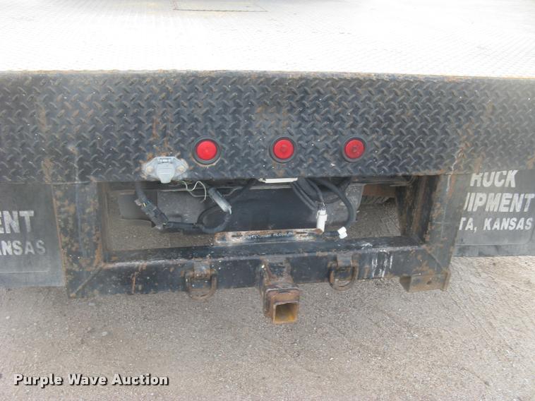 image for item L3905 2008 Dodge Ram 3500HD SLT Quad Cab flatbed pickup truck