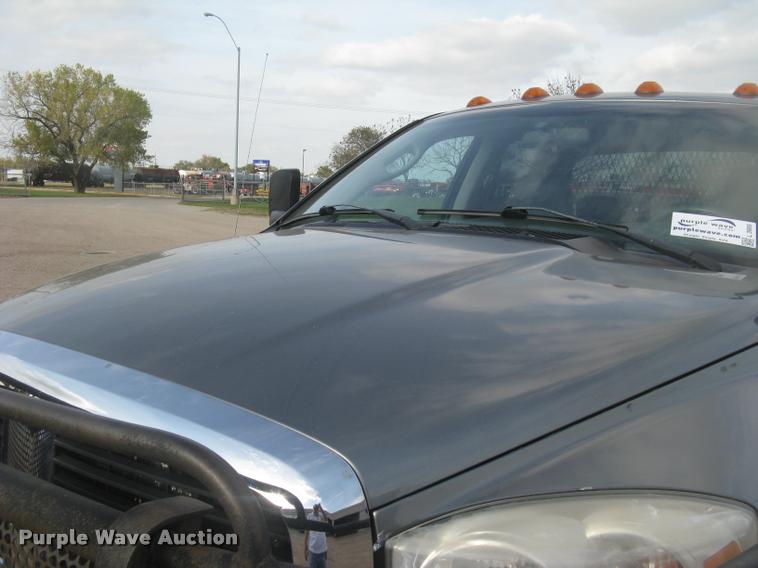 image for item L3905 2008 Dodge Ram 3500HD SLT Quad Cab flatbed pickup truck