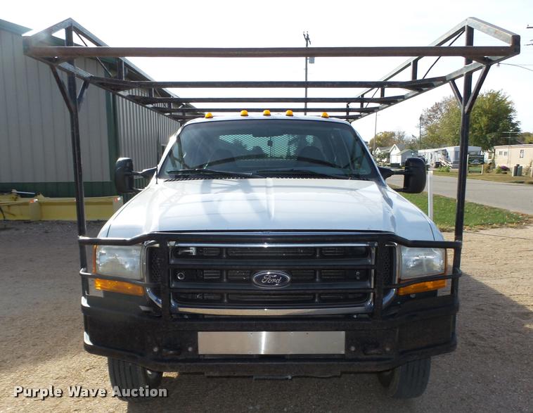 image for item L4100 1999 Ford F550 Super Duty XLT Crew Cab flatbed truck