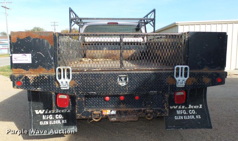 image for item L4100 1999 Ford F550 Super Duty XLT Crew Cab flatbed truck