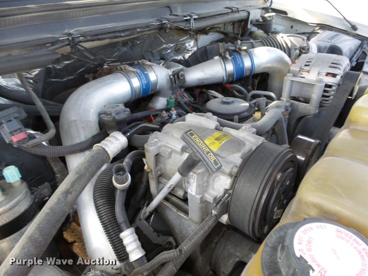 image for item L4100 1999 Ford F550 Super Duty XLT Crew Cab flatbed truck