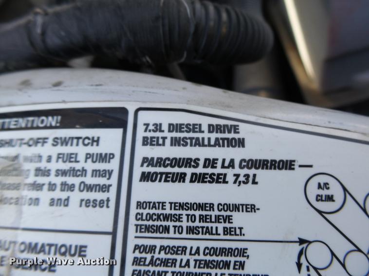 image for item L4100 1999 Ford F550 Super Duty XLT Crew Cab flatbed truck