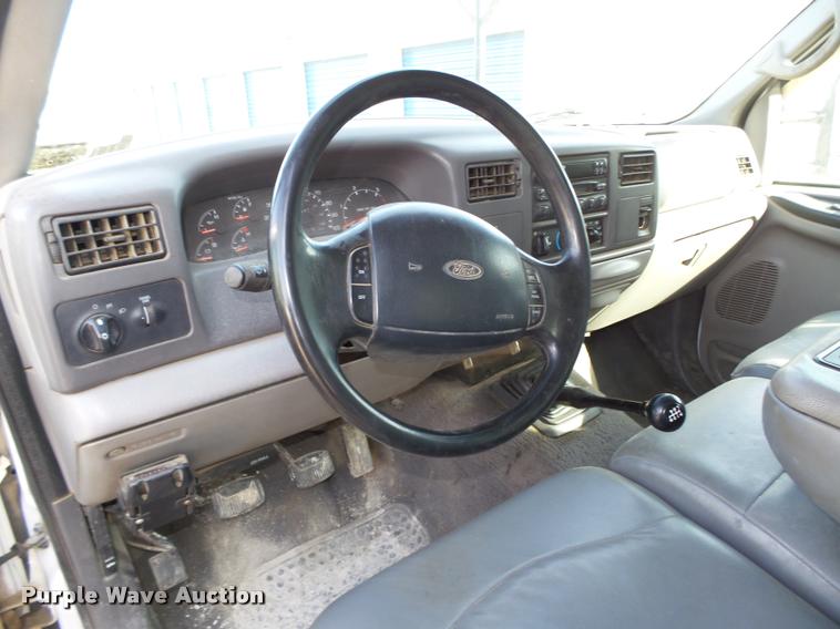 image for item L4100 1999 Ford F550 Super Duty XLT Crew Cab flatbed truck