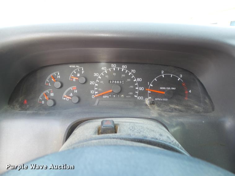 image for item L4100 1999 Ford F550 Super Duty XLT Crew Cab flatbed truck