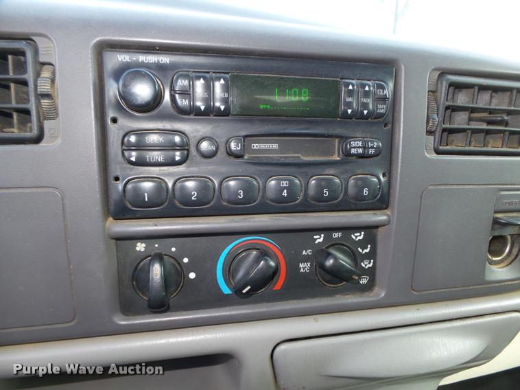 image for item L4100 1999 Ford F550 Super Duty XLT Crew Cab flatbed truck