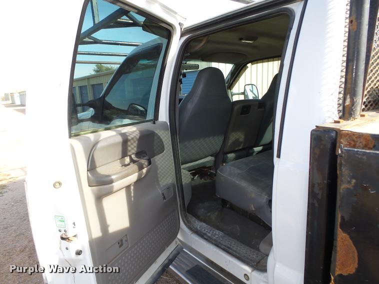 image for item L4100 1999 Ford F550 Super Duty XLT Crew Cab flatbed truck