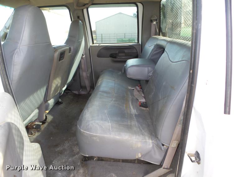 image for item L4100 1999 Ford F550 Super Duty XLT Crew Cab flatbed truck