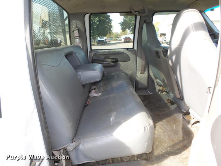 image for item L4100 1999 Ford F550 Super Duty XLT Crew Cab flatbed truck