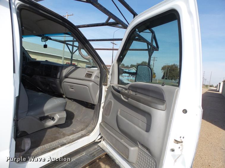 image for item L4100 1999 Ford F550 Super Duty XLT Crew Cab flatbed truck