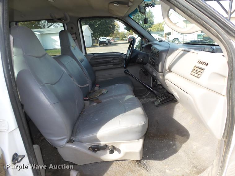 image for item L4100 1999 Ford F550 Super Duty XLT Crew Cab flatbed truck