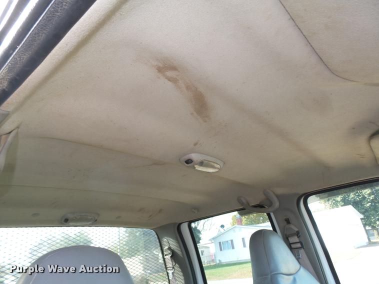 image for item L4100 1999 Ford F550 Super Duty XLT Crew Cab flatbed truck