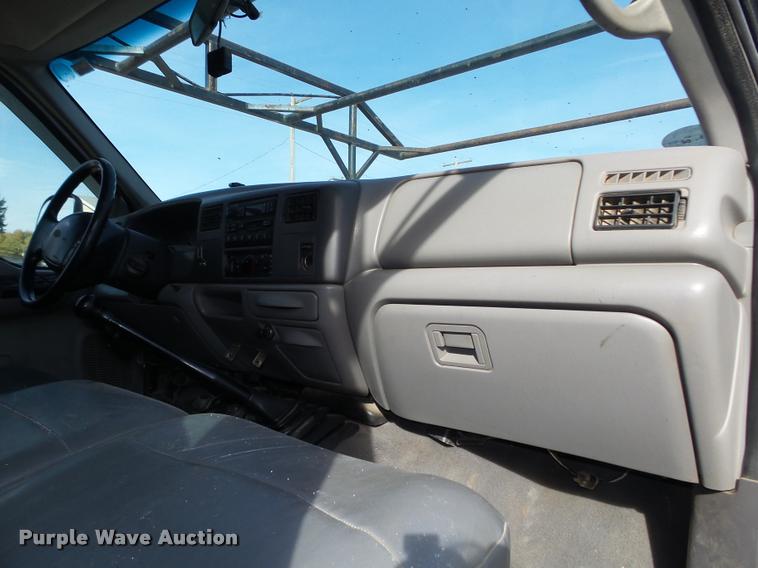 image for item L4100 1999 Ford F550 Super Duty XLT Crew Cab flatbed truck