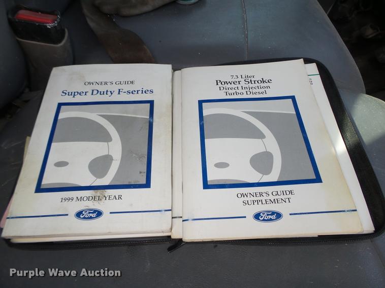 image for item L4100 1999 Ford F550 Super Duty XLT Crew Cab flatbed truck