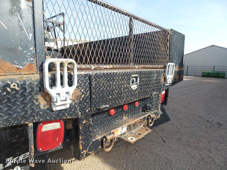 image for item L4100 1999 Ford F550 Super Duty XLT Crew Cab flatbed truck