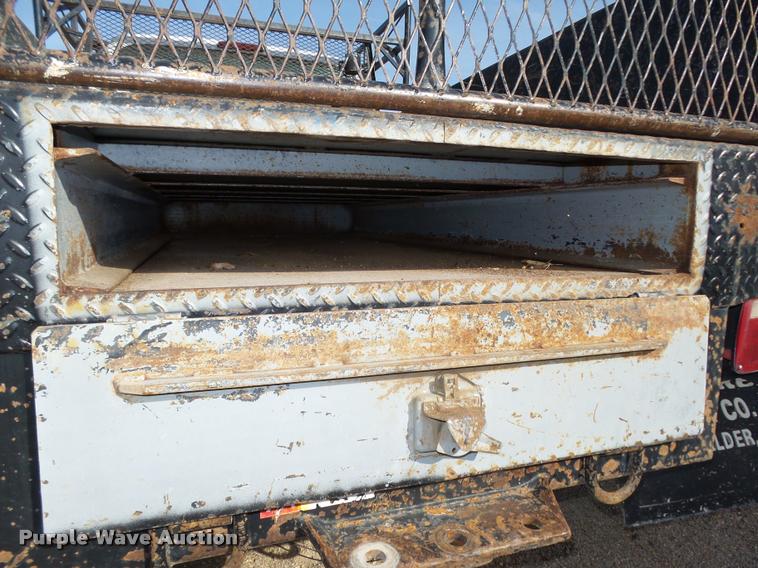 image for item L4100 1999 Ford F550 Super Duty XLT Crew Cab flatbed truck