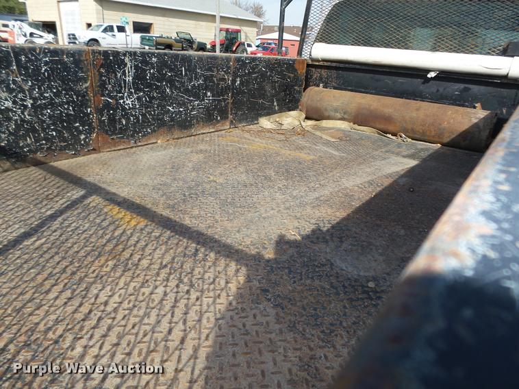 image for item L4100 1999 Ford F550 Super Duty XLT Crew Cab flatbed truck