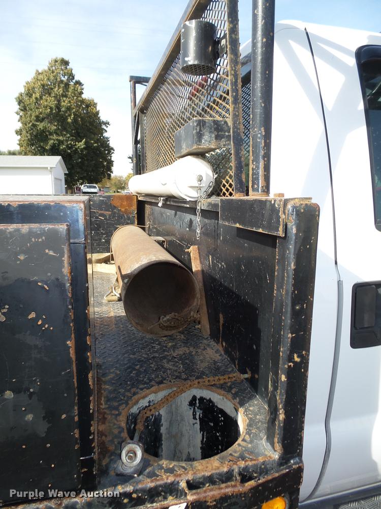 image for item L4100 1999 Ford F550 Super Duty XLT Crew Cab flatbed truck