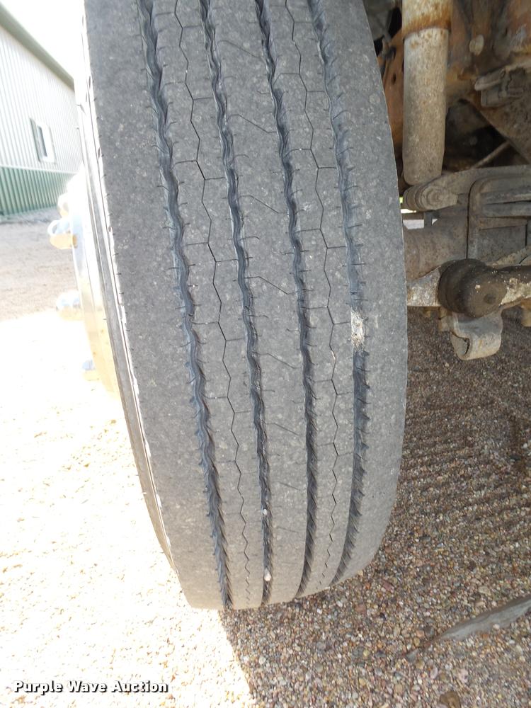 image for item L4100 1999 Ford F550 Super Duty XLT Crew Cab flatbed truck